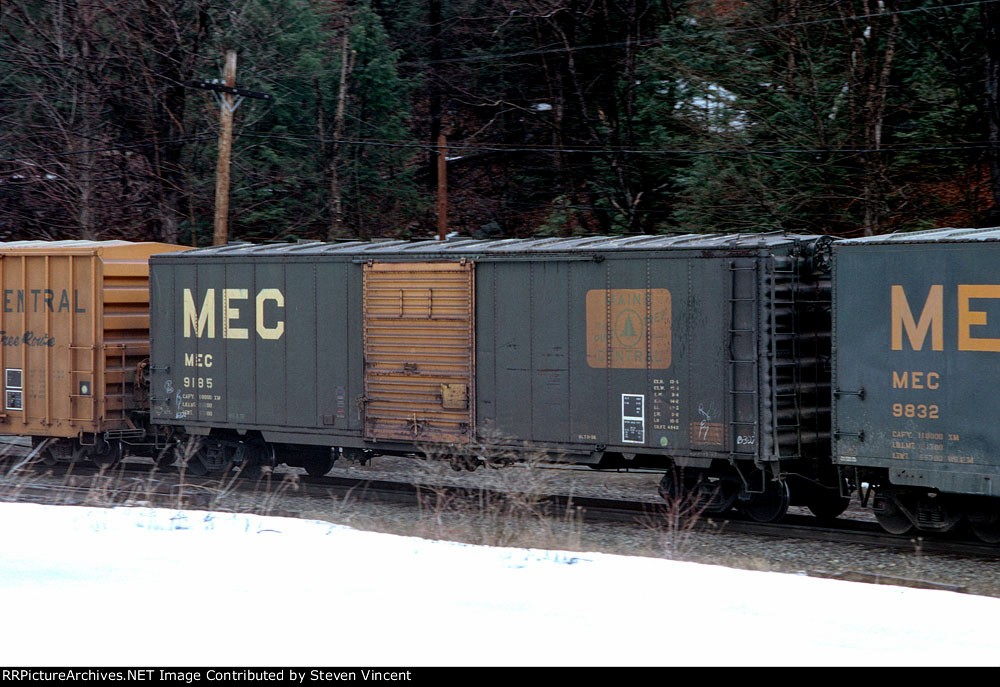 MEC 9185, 9832 on B&M freight emerging Hoosac Tunnel